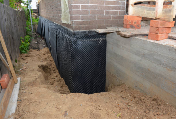 SJ Waterproofing Pros technician performing targeted Waterproofing assessment in Saint Joseph, TN